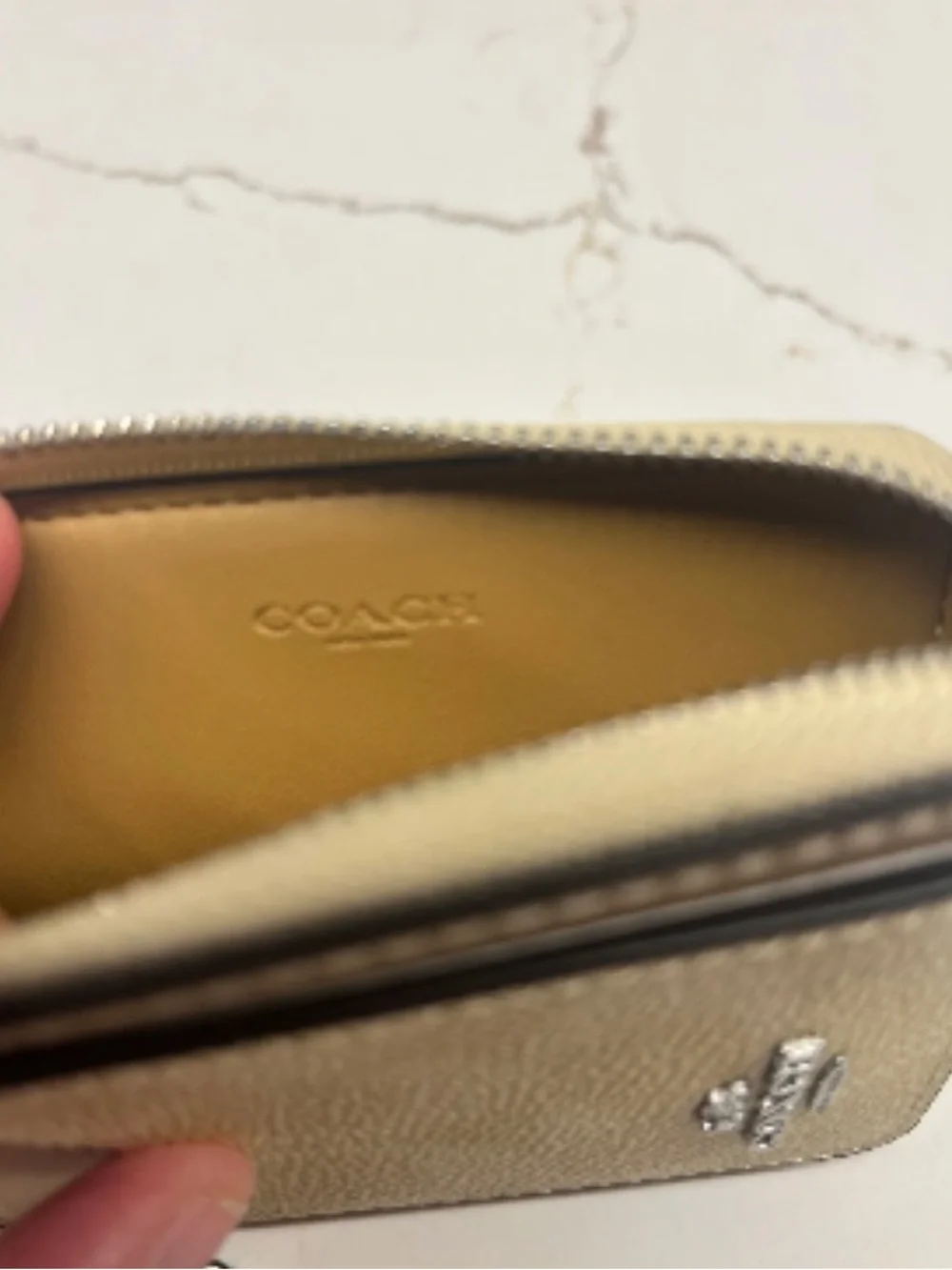Coach Zip Card Case In Signature Canvas in the color Hay